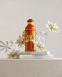 lacon Passion Bliss de Alexandre.J — parfum unisexe gourmand fruité-épice mêlant fruit de la passion juteux, lait chaud et matcha en tête, un cœur riche de miel et d’héliotrope, sur un fond chaleureux de bois de santal, safran, rhum, bois fumé et vanille.