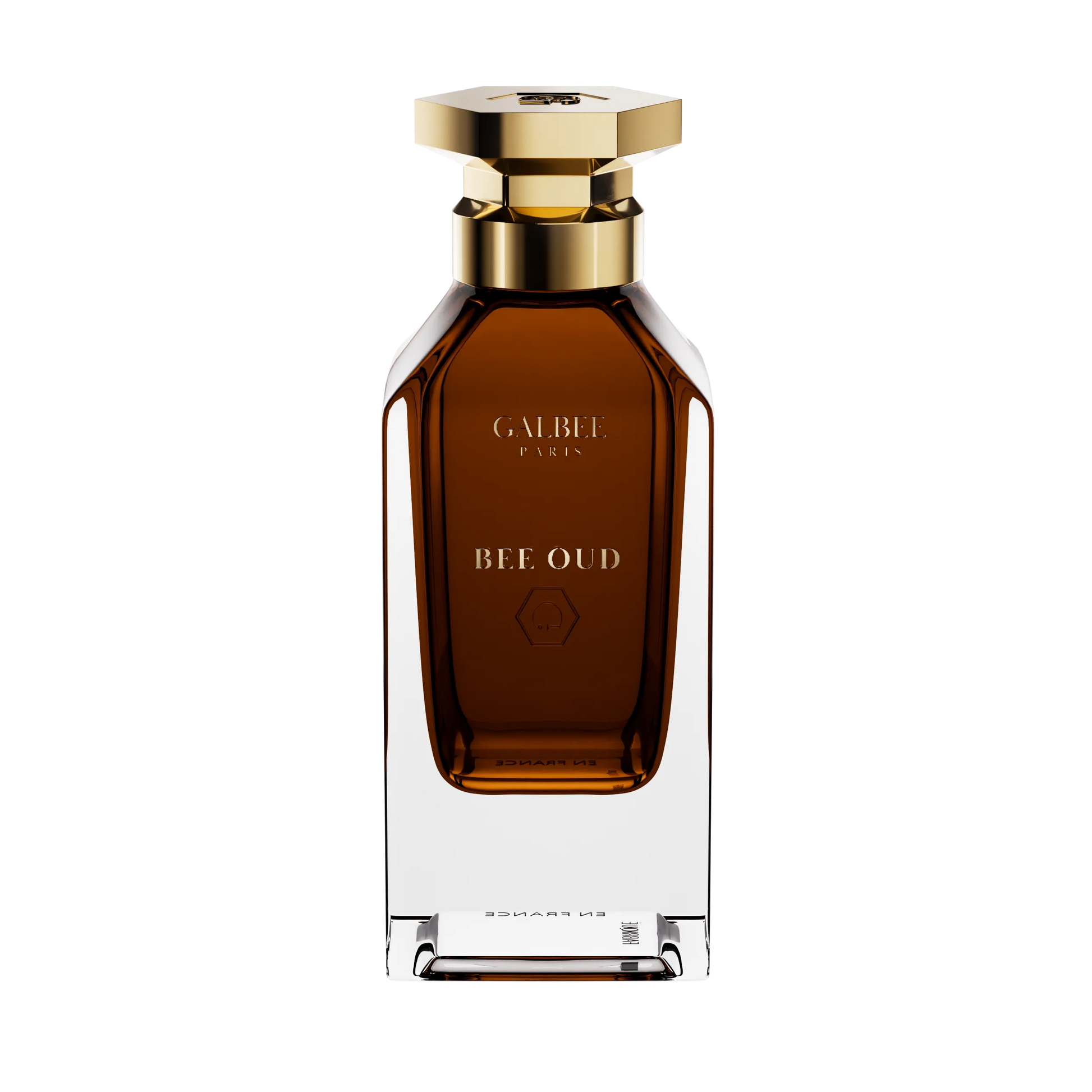 Parfum Bee Oud de GALBEE Paris – flacon raffiné en verre transparent avec bouchon doré, fragrance luxueuse alliant oud, miel et notes boisées

