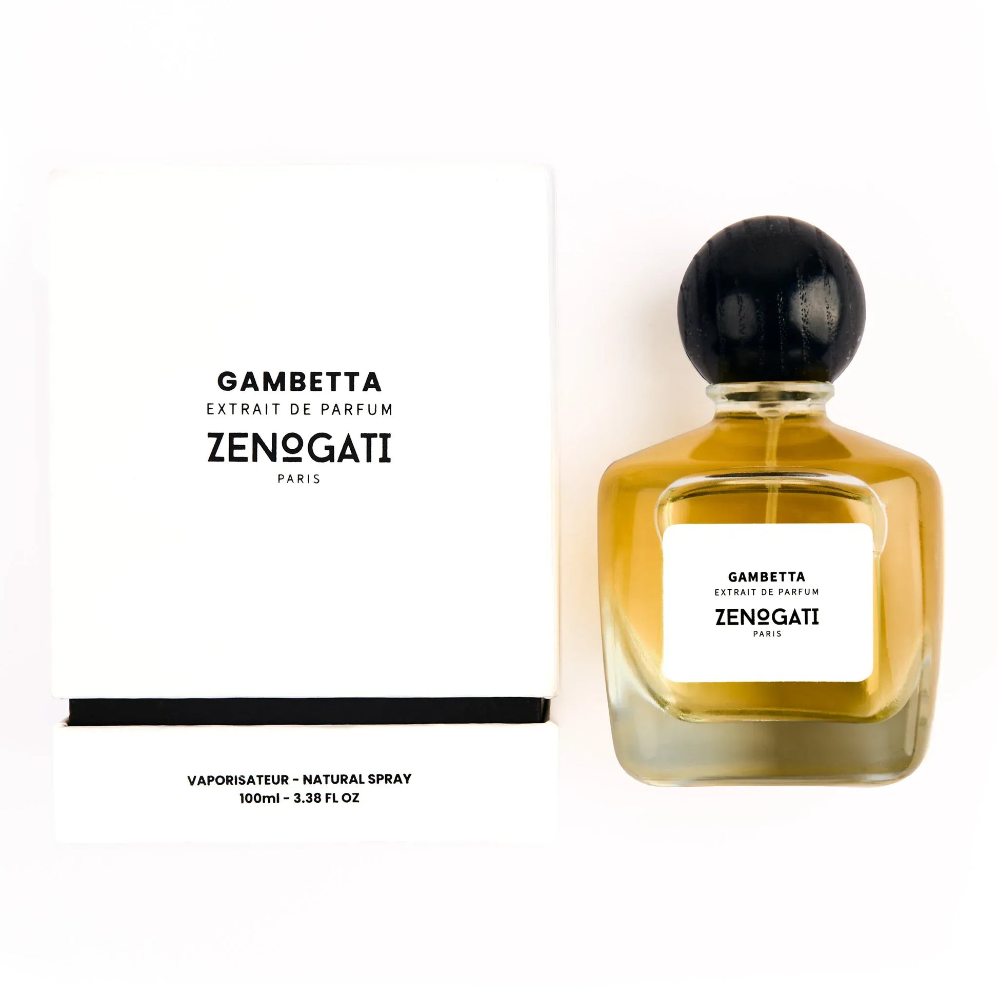 Flacon Gambetta de Zenogati — parfum unisexe fruité-floral chaleureux mêlant poire, pêche et prune en tête, cœur de rose rouge, jasmin et cannelle, posé sur un fond gourmand de caramel, muscs et cèdre de Virginie pour un sillage élégant et sensuel