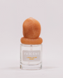 Flacon L’Eau d’Or Dort de Fascent — parfum unisexe lumineux mêlant notes d’agrumes (bergamote, cédrat, citron), fleur d’oranger, petit grain et musc blanc, évoquant la fraîcheur d’un matin doré, pure et sereine.