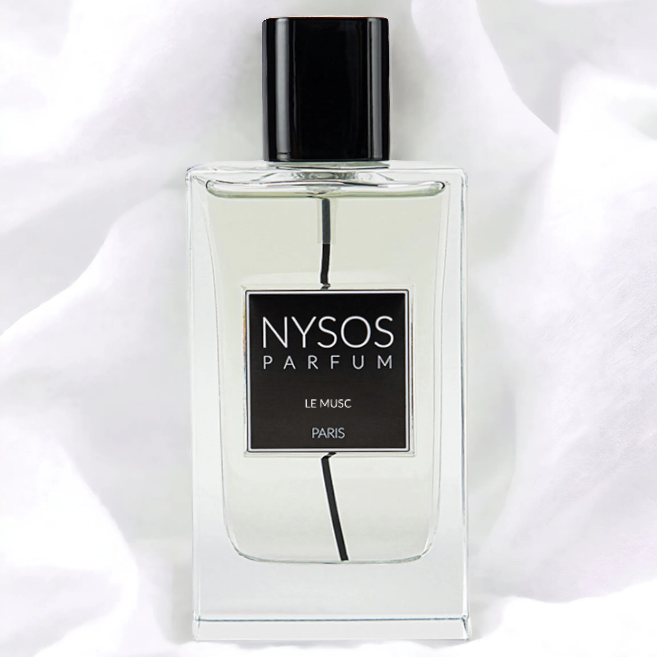 Parfums de niche Le Musc de Nysos Parfums : parfum musqué floral-boisé, bouquet de fleurs blanches, vanille-praliné, bois de santal et cèdre pour une profondeur chaleureuse