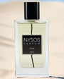 Flacon Le Oud de Nysos Parfums, parfum intense au bois de oud, safran, rose, encens et ambres — contraste oriental puissant
