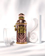 Flacon Morning Muscs d’Alexandre.J — parfum floral-fruité musqué unisexe mêlant mandarine, pamplemousse et pêche juteuse rehaussés d’une touche gourmande de caramel, un cœur riche de roses (Russie & Turquie), patchouli et violette, posé sur un fond doux de musc et mousse, évoquant une aube douce et lumineuse.