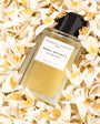 Flacon Neroli Botanica d’Essential Parfums — parfum aromatique floral unisexe mêlant curcuma chaud, gingembre et poivres en tête, cœur de néroli, jasmin sambac et fleur d’oranger, posé sur un fond de vétiver et bois de santal pour équilibre frais et enveloppant