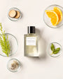 Flacon Orange X Santal d’Essential Parfums — parfum unisexe citrus-boisé éclatant mêlant orange amère italienne (jus et zeste), basilic d’Égypte et cyprès naturel, posé sur un fond chaleureux de bois de santal australien et mousse de chêne française. Une composition fraîche, lumineuse et sensuelle, dotée d’ingrédients naturels et d’un flacon rechargeable.