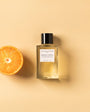 Flacon Orange X Santal d’Essential Parfums — parfum unisexe citrus-boisé éclatant mêlant orange amère italienne (jus et zeste), basilic d’Égypte et cyprès naturel, posé sur un fond chaleureux de bois de santal australien et mousse de chêne française. Une composition fraîche, lumineuse et sensuelle, dotée d’ingrédients naturels et d’un flacon rechargeable.