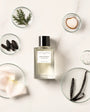 Flacon Rose Magnetic d’Essential Parfums — parfum unisexe floral-boisé naturel mêlant pamplemousse amer et menthe pour une ouverture fraîche, un cœur de rose luxuriante et litchi, posé sur un fond riche de cèdre naturel, vanille, fève tonka et muscs doux.