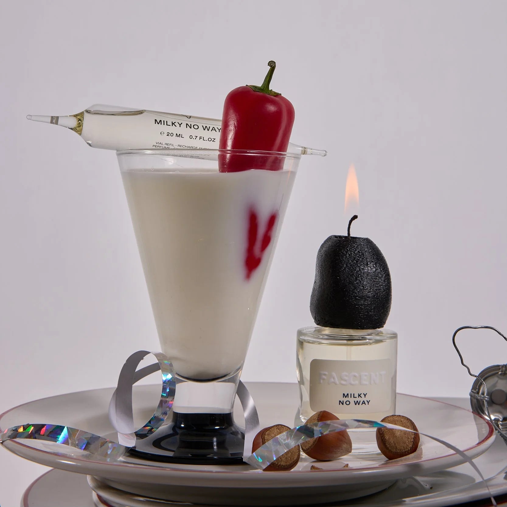 parfum de niche milky no way de la maison fascent avec un lait et un piment dedans 