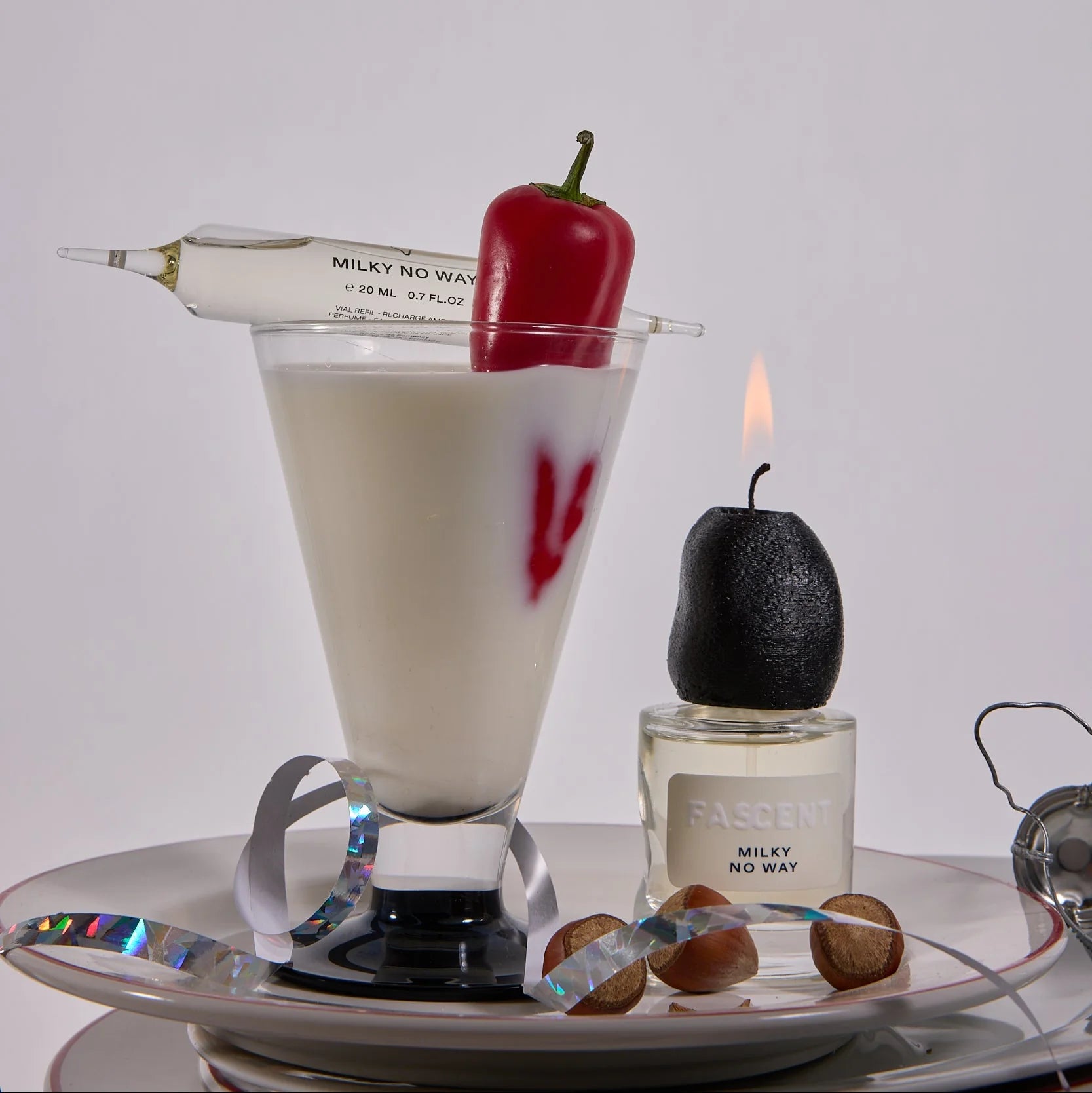 parfum de niche milky no way de la maison fascent avec un lait et un piment dedans 